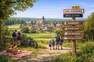 Picturesque Sud Essonne landscape with a stone village, green countryside, forest, and people enjoying outdoor activities.
